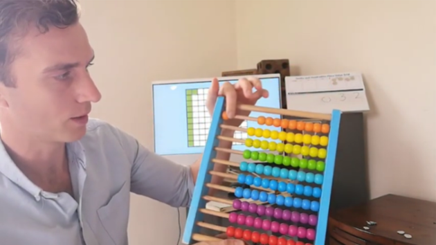 Twinkl fractions and decimals lesson using an abacus