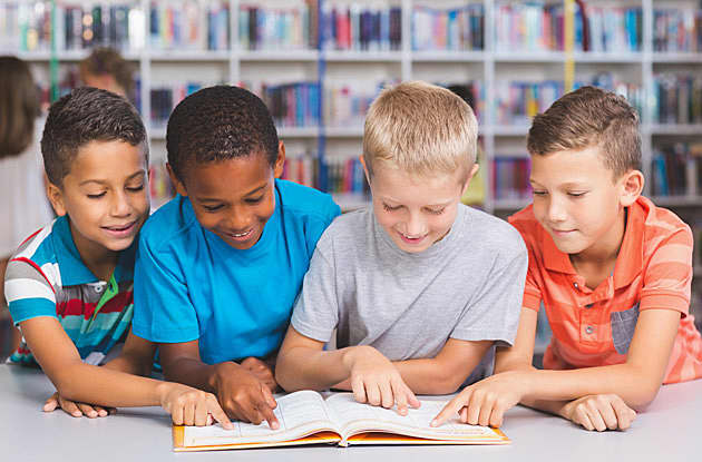 boys reading-book-together