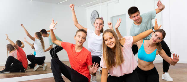 group of teenagers in a dance class